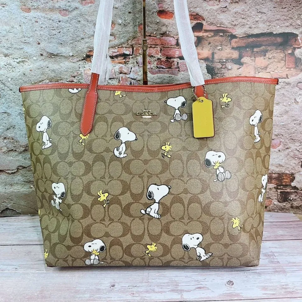 COACH®  Coach X Peanuts City Tote In Signature Canvas With Snoopy  Woodstock Print