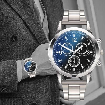 ผู้ชายระดับไฮเอนด์ที่มีสีสันแก้วสีฟ้าสามตาเหล็กวงนาฬิกาผู้ชายนาฬิกาควอทซ์ของขวัญนาฬิกาผู้ชาย