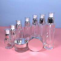 20g 50g clear glass skin care jar with silver cover20 100ml glass bottles with lotion and spray pump