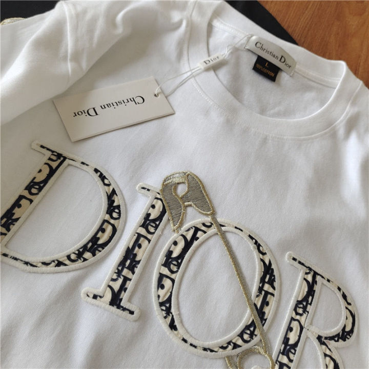 Christian Dior Judy Blame Safety Pin logo tee t shirt Mens Fashion Tops   Sets Tshirts  Polo Shirts on Carousell