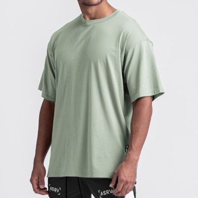 ：“{—— Sport T Shirt Men Training Jogging Shirts Gym Sportswear Short Sleeve Quick Dry Basketball Tshirt Running Fitness Sports Jerseys