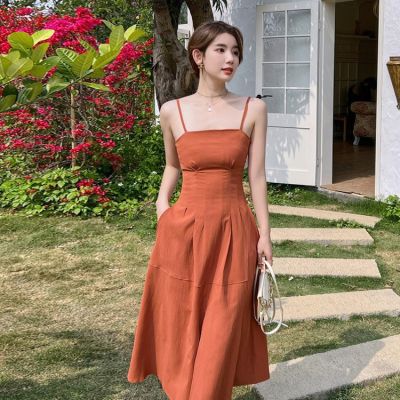 Hepburn wind orange strap dress female Xia Xiaozhong design sense of senior French a word skirt waist show thin split