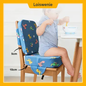 Child booster cushion outlet for dining chair