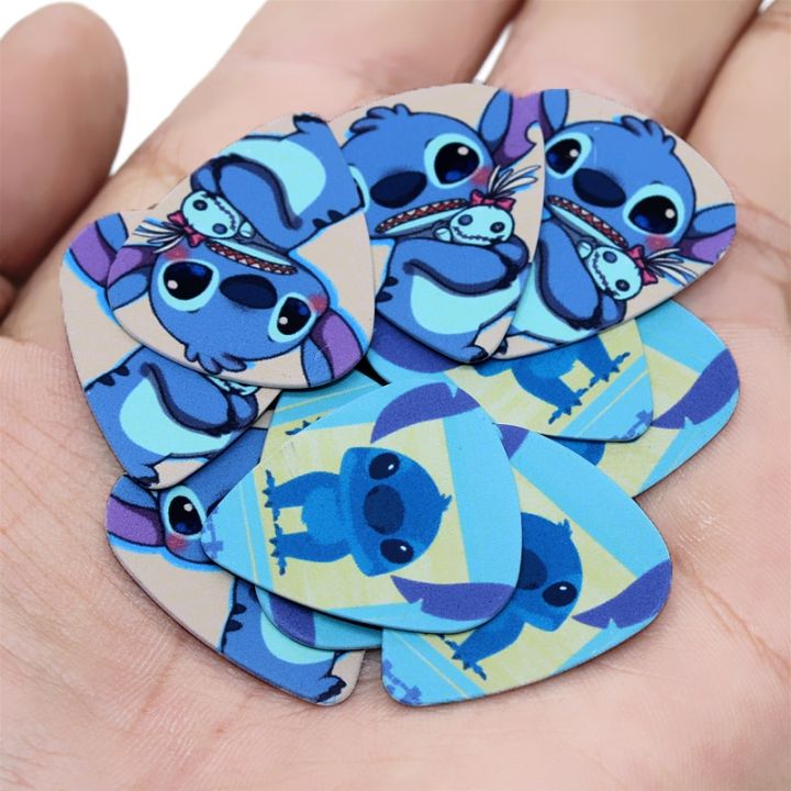 soach-10pcs-0-71mm-high-quality-two-side-earrings-pick-diy-design-guitar-guitar-picks-european-and-american-cartoon-characters-guitar-bass-accessori