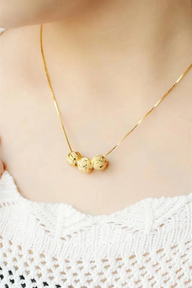 Gold necklace with hot sale gold beads