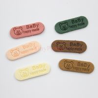 50pcs Soft Suede Embossed Hand Made Tags Baby Bear Label Tags Sewing Garment Tags for Baby Hats Gloves Socks Embellishment Stickers Labels