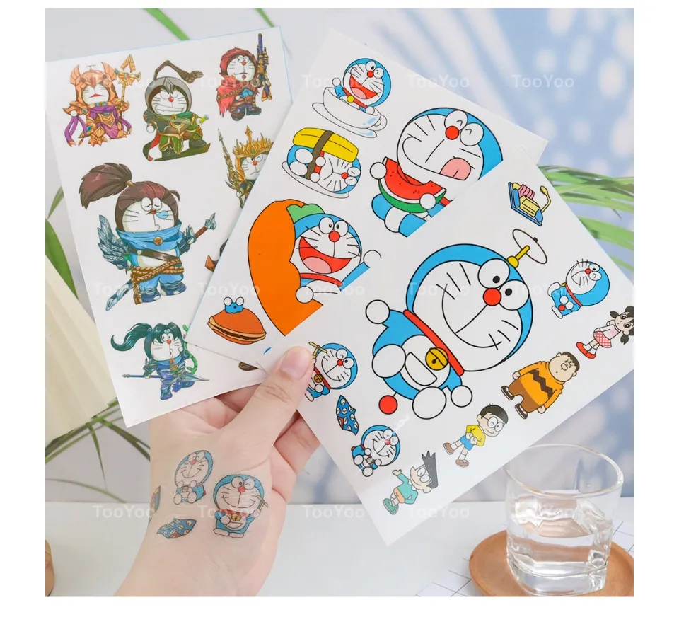 Hình xăm Doraemon dễ thương: Những hình xăm Doraemon dễ thương sẽ mang đến cho bạn một diện mạo đáng yêu và độc đáo. Những hình xăm này sẽ giúp cho bạn tỏa sáng và thu hút sự chú ý từ mọi người xung quanh. Hãy cùng khám phá những hình xăm Doraemon dễ thương qua hình ảnh liên quan đến từ khóa này!
