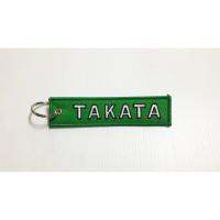 พวงกุณแจผ้างานปักสวย สี เขียว ลายป้ก TAKATA สี ขาว